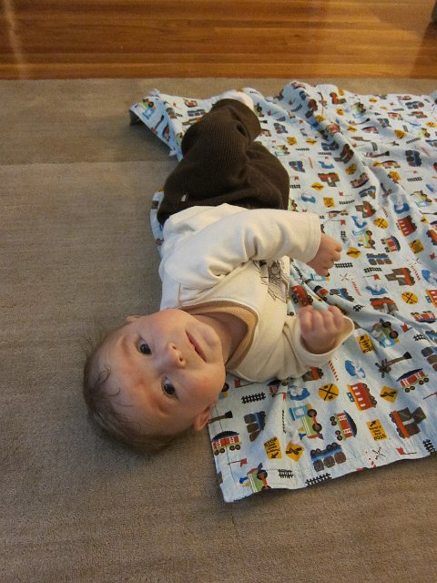 1st Roll from Belly to Back.JPG - We caught Nathan's first roll from belly to back, he's moving right along with all of his milestones!
